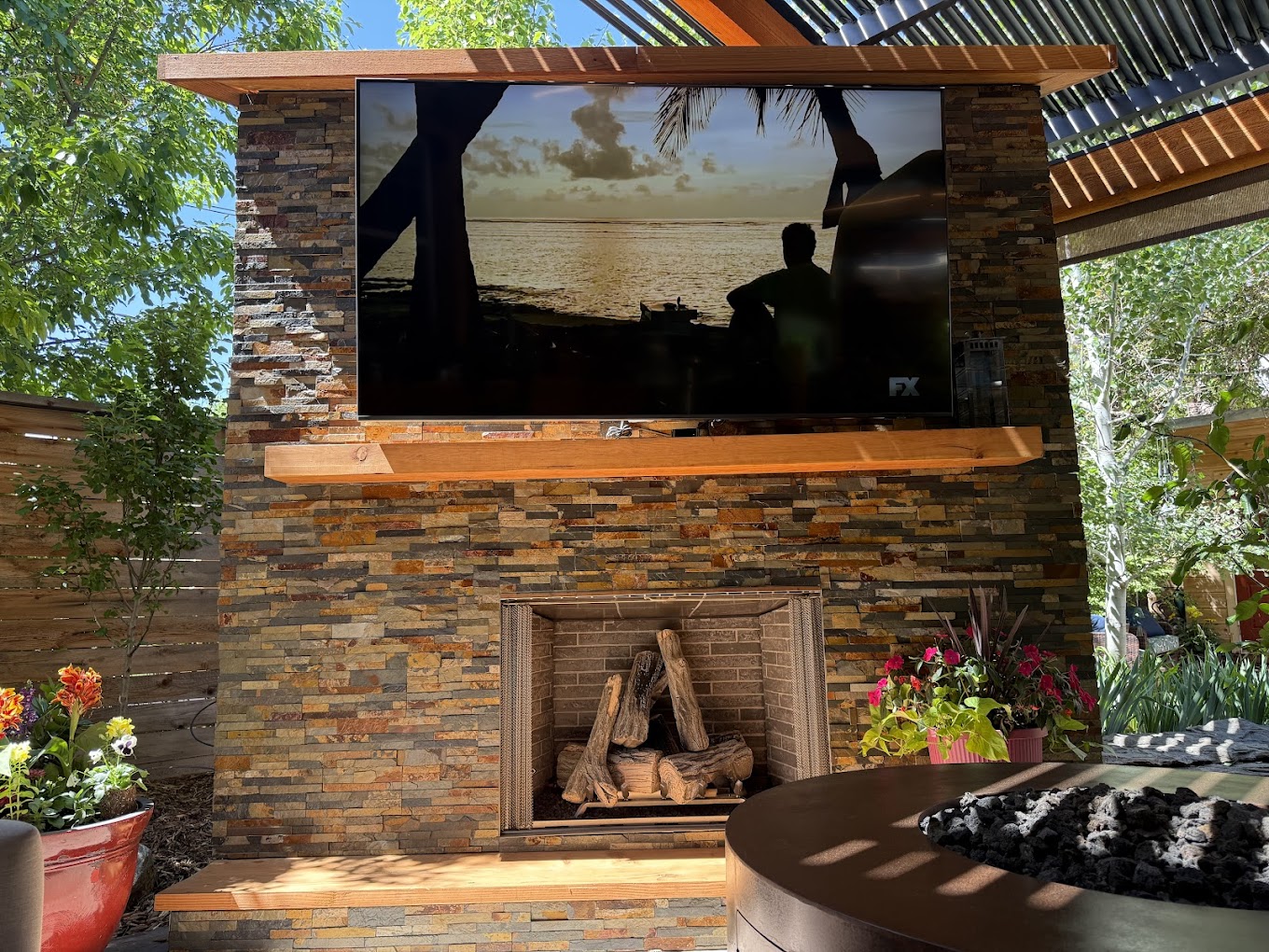 Custom concrete patio with outdoor fireplace